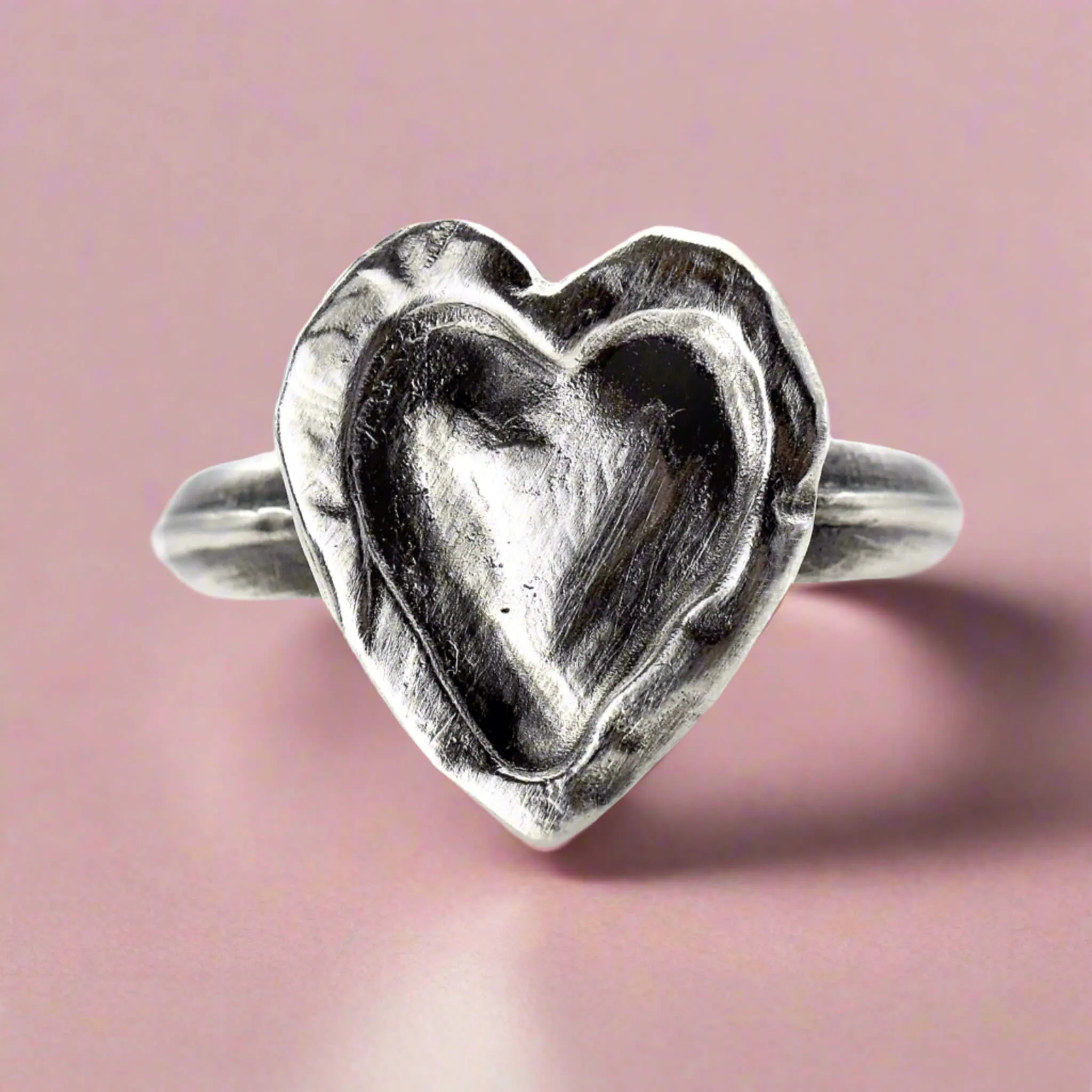 Carved Heart Of Silver Ring