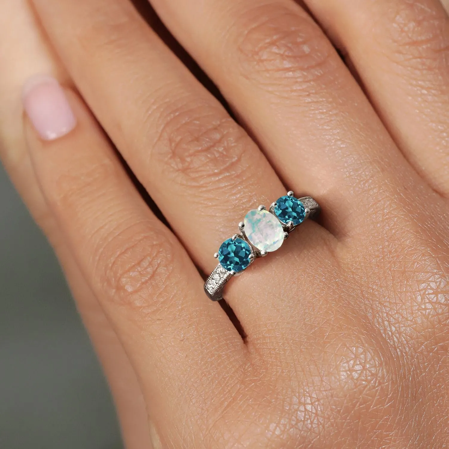 Gem Stone King 925 Sterling Silver Oval Cabochon White Simulated Opal and London Blue Topaz Ring For Women (1.75 Cttw, Gemstone Birthstone, Available In Size 5, 6, 7, 8, 9)