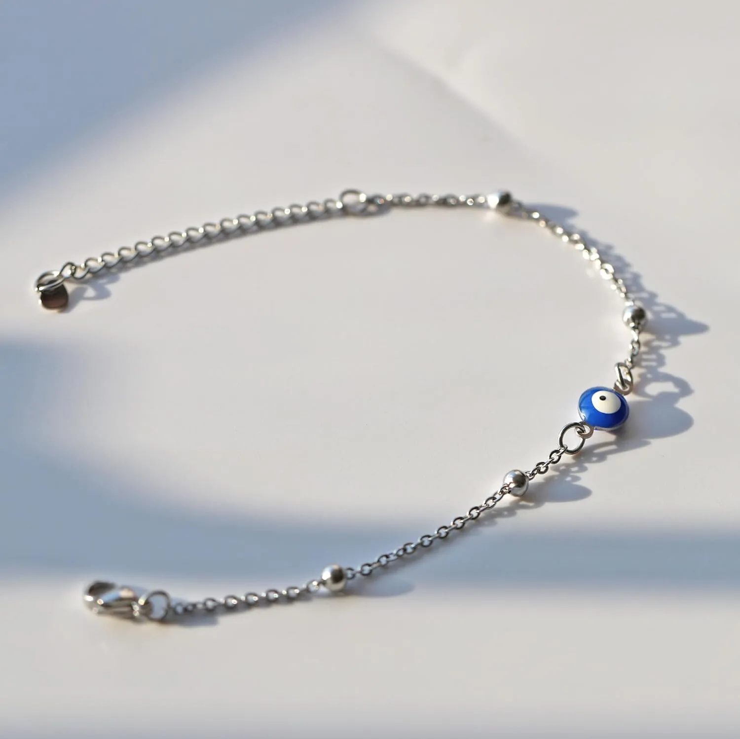 Rnivida Stainless Steel Evil Eye Bracelet for Women Minimalist Blue Evil Eye Protection Link Chain Bracelet